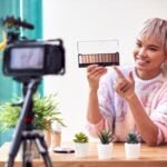 Female Vlogger Recording Beauty And Make Up Video At Home With Camera